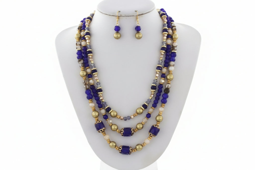 Necklace and earrings set with blue and gold beads